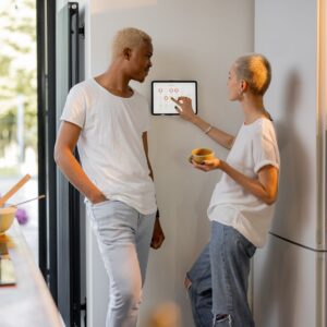 Couple looking at their thermometer